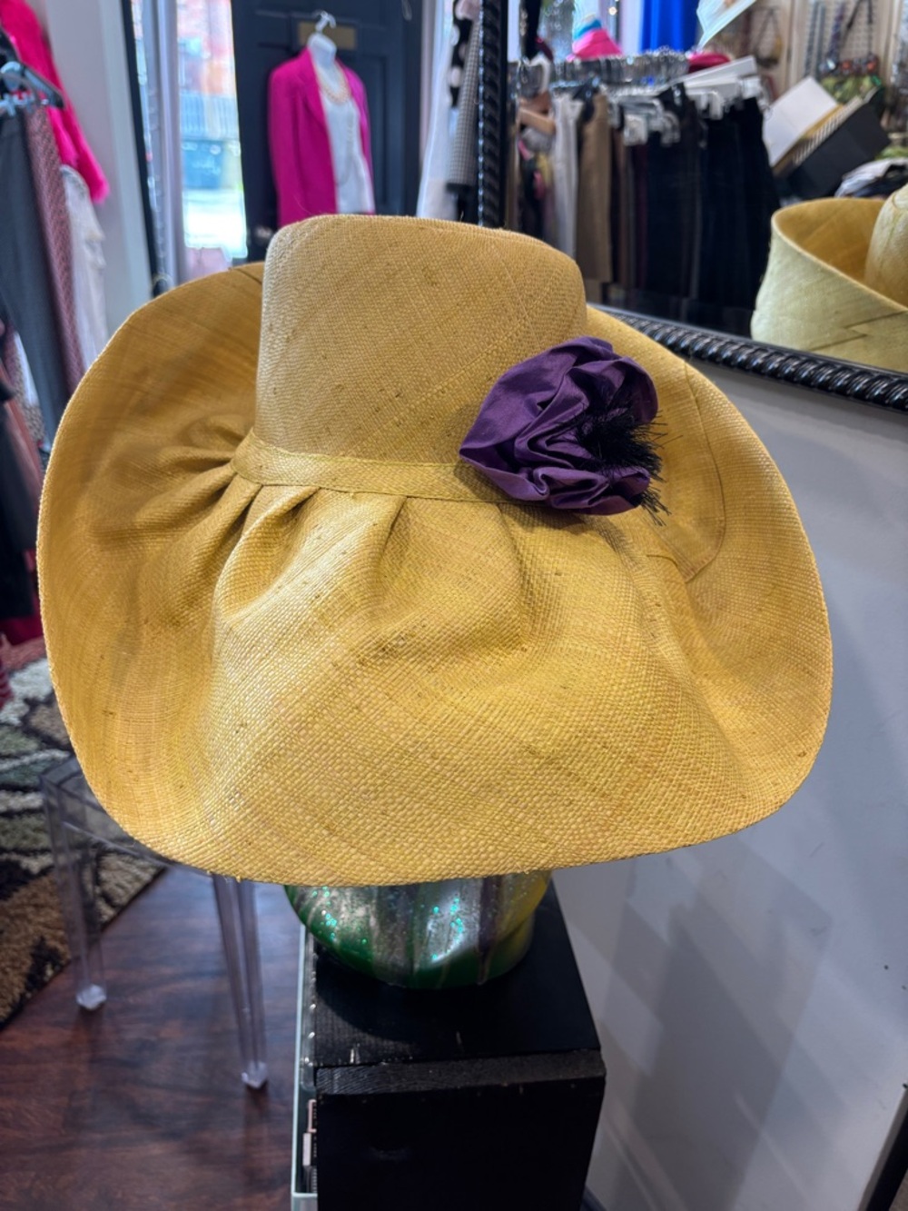 Wide-Brim Yellow Straw Hat with Purple Flower Accent